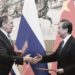 Russia's Foreign Minister Sergei Lavrov (left) and Chinese State Councilor and Foreign Minister Wang Yi (right) shake hands right after their signing at the Diaoyutai State Guest House in Beijing, China, on April 23, 2018. (Kyodo News/ Madoka Ikegami, Pool)