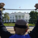 A member of the Uyghur American Association rallies in front of the White House, Thursday, Oct. 1, 2020, after marching from Capitol Hill in Washington, in support of the Uyghur Forced Labor Prevention Act which has passed the House and now will go on to the Senate. The bill prohibits some imports from Xinjiang and imposes sanctions for human rights violations. (Jacquelyn Martin/AP Photo)