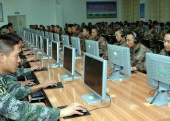 In this undated photo, Chinese soldiers are pictured working at computers. (Source: mil.huanqiu.com)