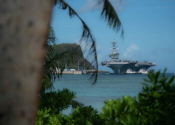 The aircraft carrier Theodore Roosevelt (CVN 71) transits Apra Harbor as the ship prepares to moor in Guam on Feb. 7, 2019.  (U.S. Navy photo by Mass Communication Specialist 3rd Class Terence Deleon Guerrero)