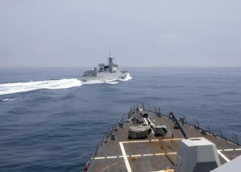 The USS Chung-Hoon observes a Chinese navy ship conduct what it called an "unsafe” Chinese maneuver in the Taiwan Strait, on June 3, 2023. The Chinese navy ship cut sharply across the path of the American destroyer, forcing the U.S. ship to slow to avoid a collision. (Mass Communication Specialist 1st Class Andre T. Richard/U.S. Navy via AP)