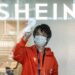 A man cleaning the windows of the first permanent showroom of Chinese online fast fashion giant Shein, during a media preview in Tokyo on Nov. 10, 2022. (Richard Brooks/AFP via Getty Images)